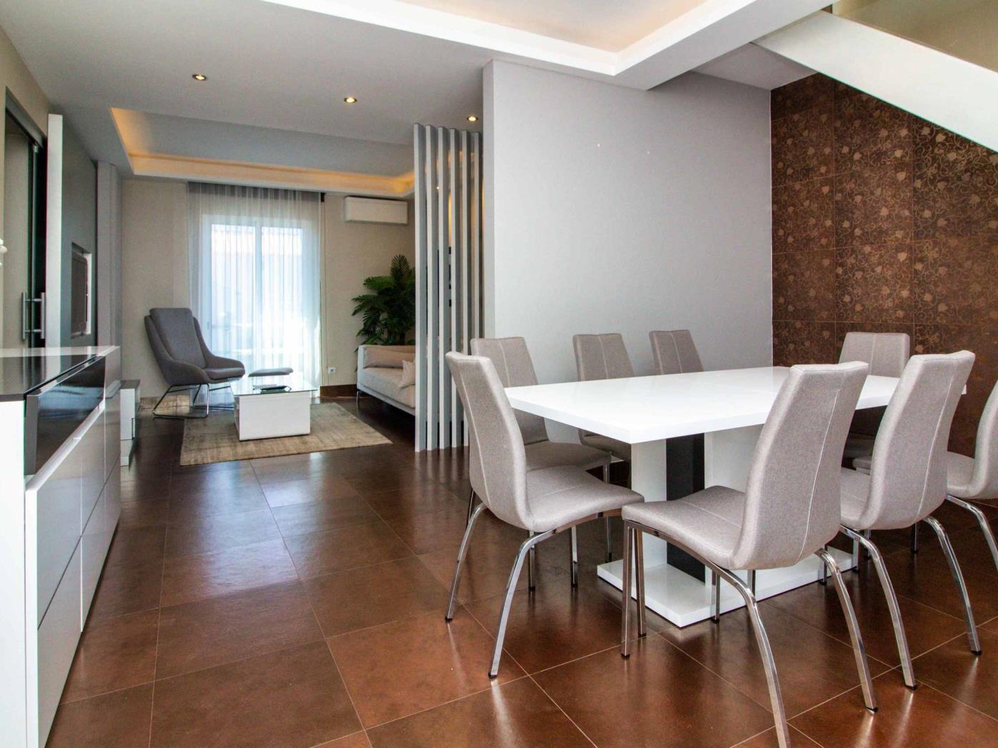 Dining and living area inside Dunas Salgados Apartment