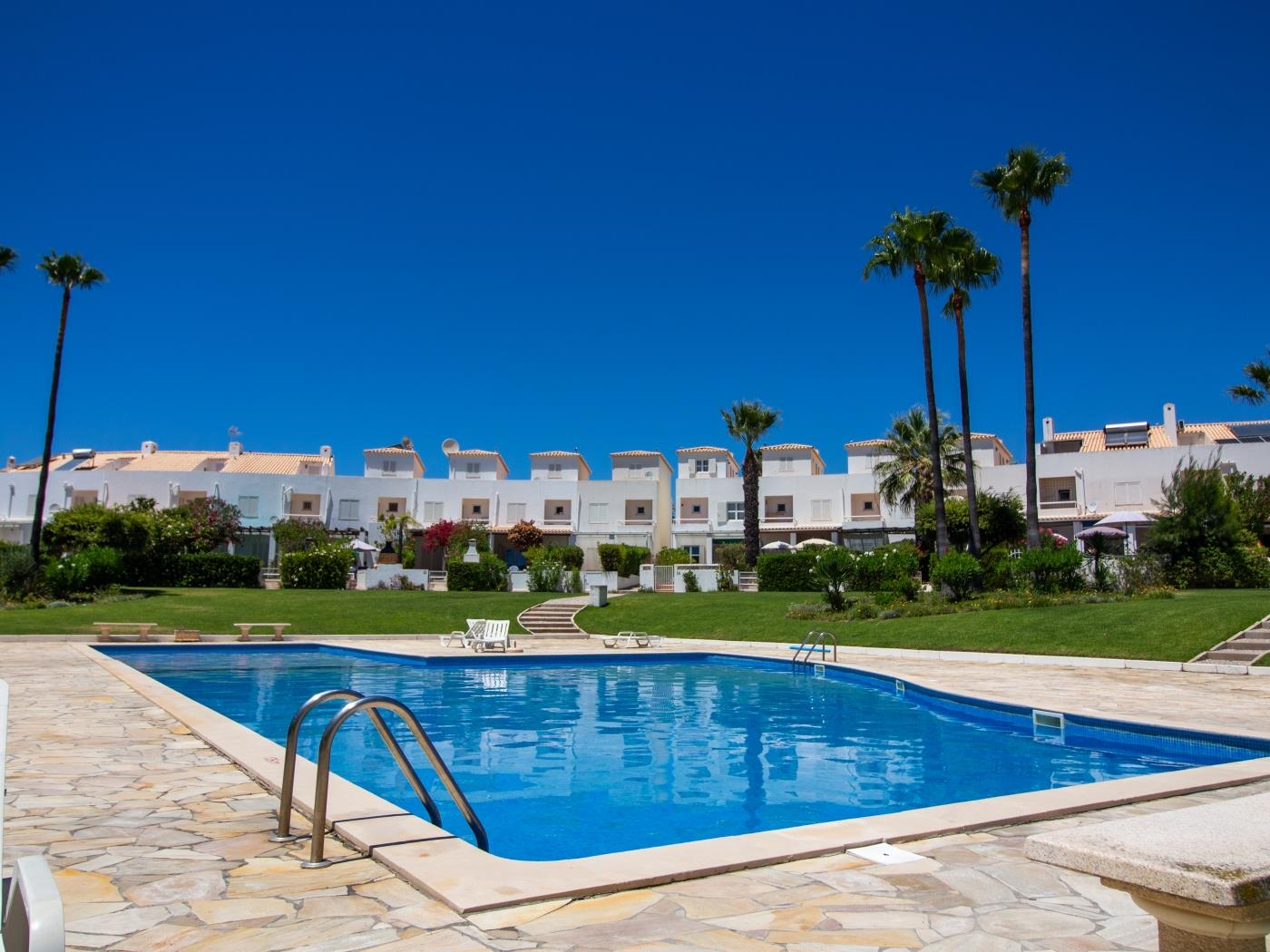 Shared swimming pool at Dunas Salgados Apartment